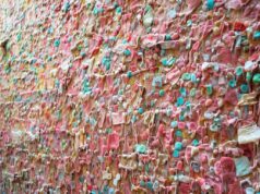 The Bubblegum Alley: A wall covered with chewed gum in California The Bubblegum Alley